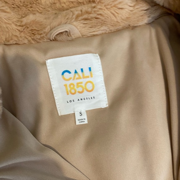 This is a furry cropped jacket, adjustable bottom for tightness - Picture 2 of 2